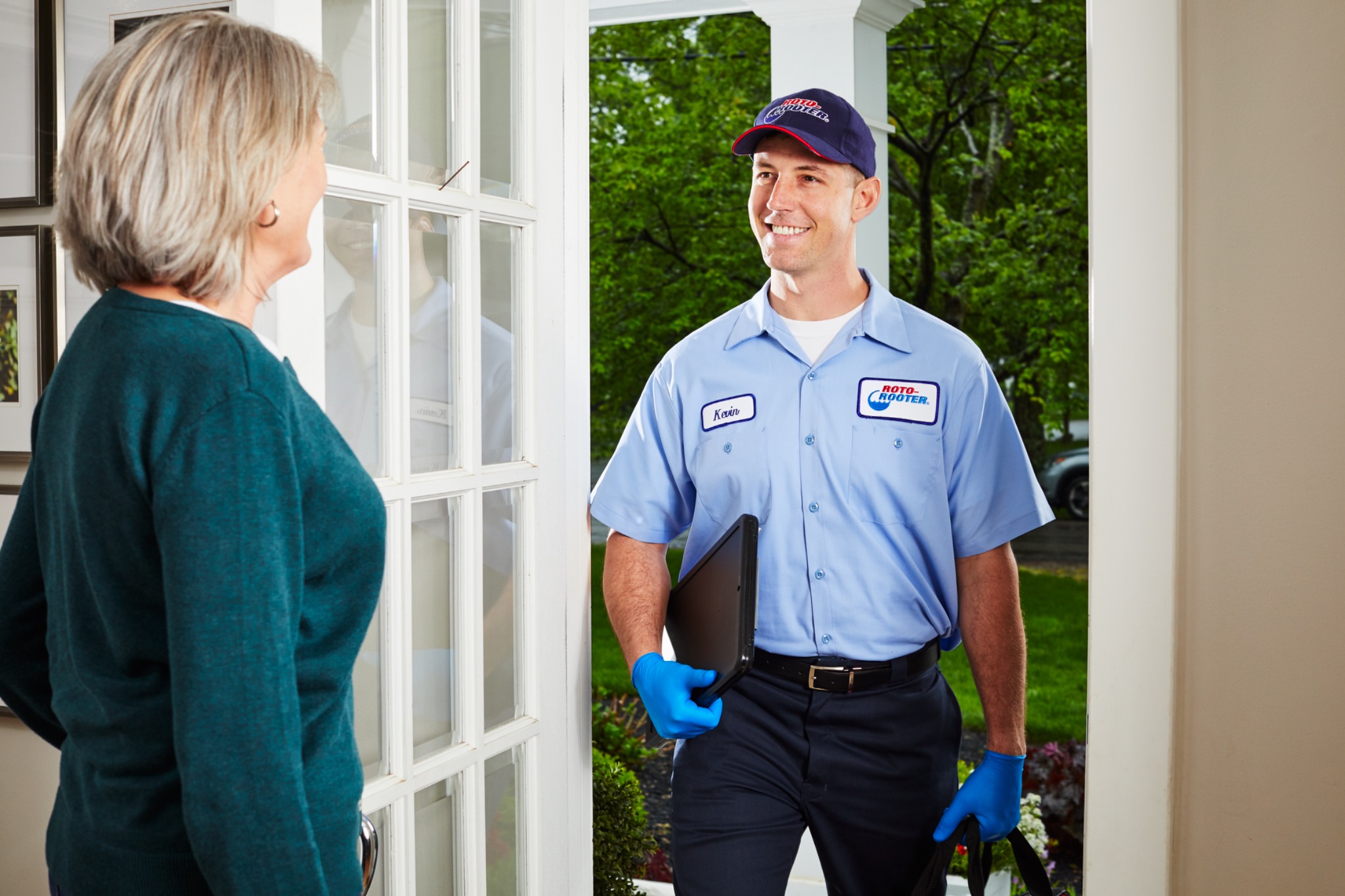 Roto-Rooter technician arriving at customer's home